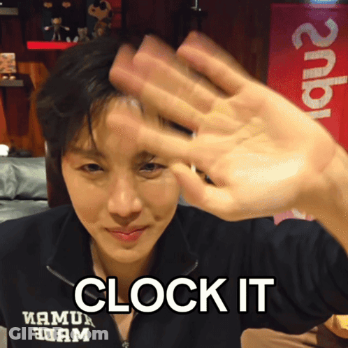 Person Covering Face With Clock It GIF
