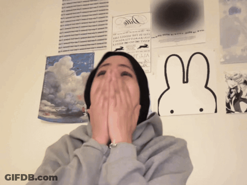 Person Covering Mouth In Front Of Bunny Poster GIF