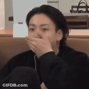 Person Covering Mouth With Hand GIF
