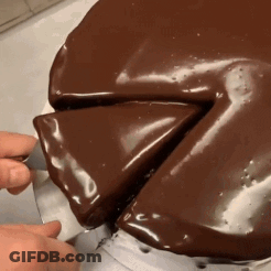 Person Cutting Chocolate Cake GIF