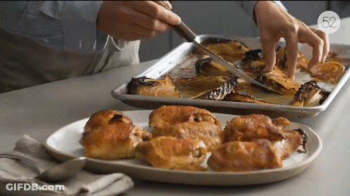 Person Cutting Food With Knife In Front Of Pan Number 59 GIF