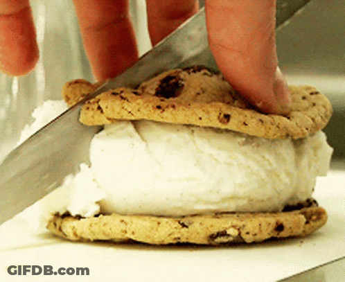 Person Cutting Ice Cream Sandwich With Knife GIF