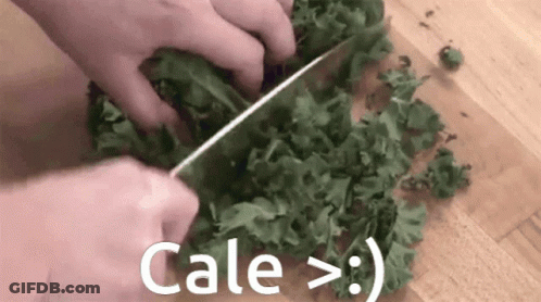 Person Cutting Kale With Knife GIF