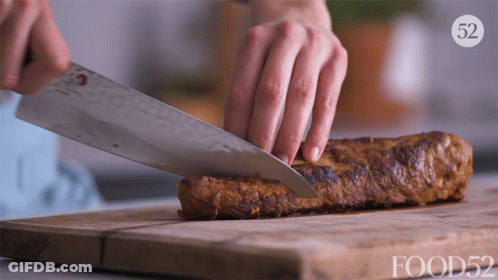 Person Cutting Meat On Board With 52 GIF