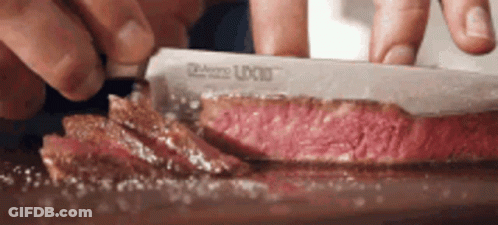 Person Cutting Meat With U-Cut Knife GIF