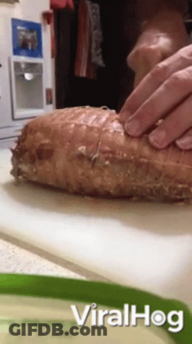 Person Cutting Meat With Viralhog GIF