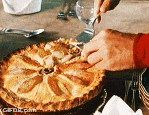Person Cutting Pie With Fork And Knife GIF