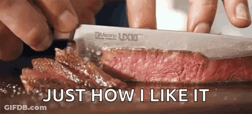 Person Cutting Steak With Knife And Words Just How I Like It GIF
