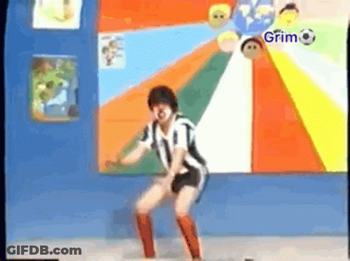 Person Dancing In Front Of Grim Wall GIF
