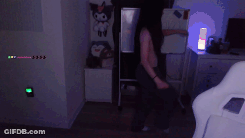 Person Dancing In Purple Light GIF