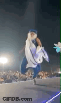 Person Dancing On Stage At Night GIF