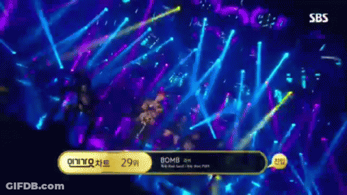 Person Dancing On Stage With SBS Sign GIF