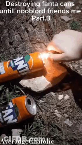 Person Destroying Fanta Cans With Lighter GIF