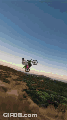 Person Doing Dirt Bike Trick In Air GIF