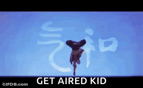 Person Doing Handstand In Front Of Blue Background With Chinese Writing GIF