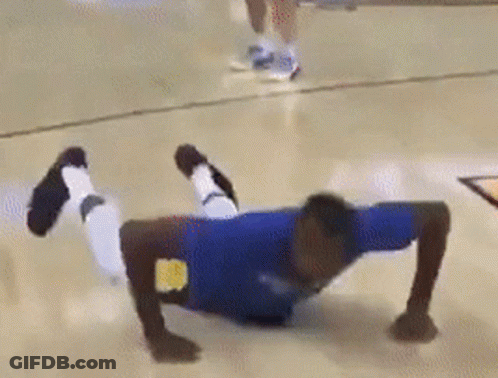 Person Doing Push Ups On Basketball Court GIF