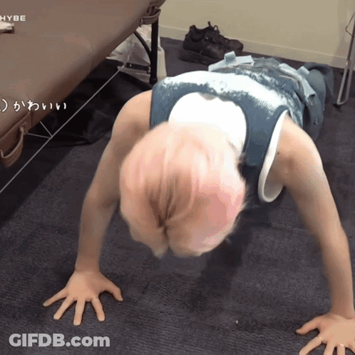 Person Doing Push Ups With HYBE Logo GIF
