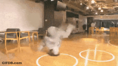 Person Doing Trick On Basketball Court GIF