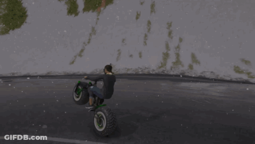 Person Doing Trick On Motorcycle On Road GIF