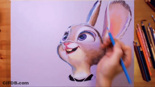 Person Drawing Bunny With Blue Pencil GIF