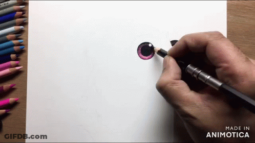 Person Drawing Cat Eye With Colored Pencils GIF