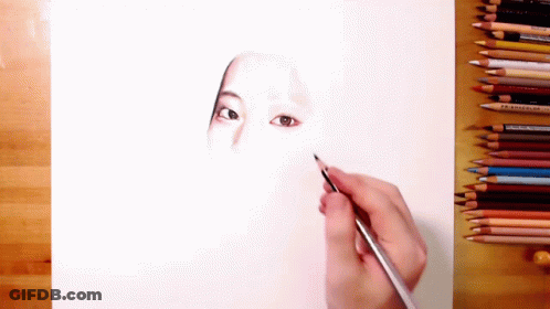 Person Drawing Woman Face With Colored Pencils GIF
