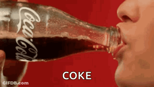 Person Drinking Bottle Of Coca Cola GIF