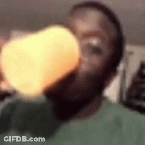 Person Drinking From Cup With Light GIF