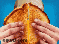 Person Eating Grilled Cheese Sandwich GIF