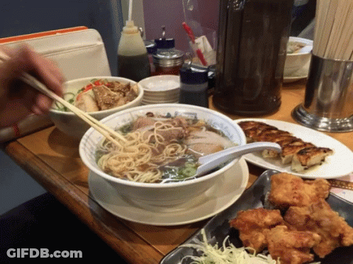 Person Eating Noodles With Chopsticks GIF