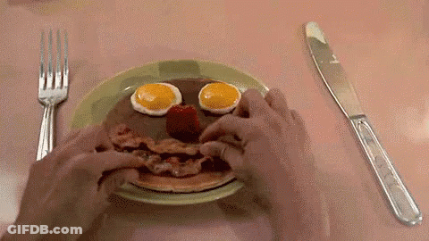 Person Eating Pancake Face With Eggs Bacon Strawberries GIF