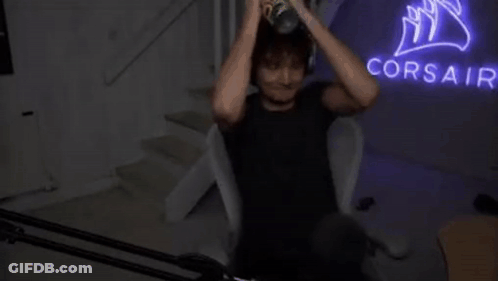 Person Exercising On Rowing Machine At Corsair Sign GIF