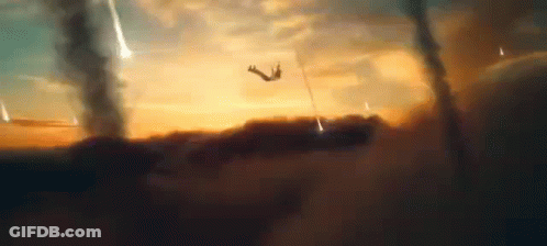 Person Falling From Cliff At Sunset GIF