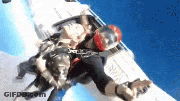 Person Falling From Plane With Helmet GIF