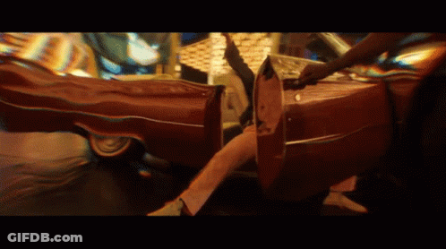 Person Getting Out Of Car With Legs Crossed GIF