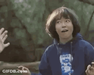 Person Giving Child High Five Holding Bubble Gum GIF