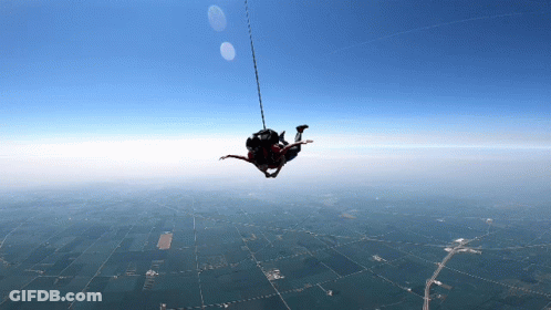 Person Hanging From Rope GIF