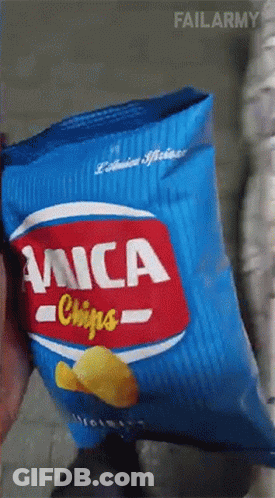 Person Holding Bag Of Mica Chips GIF
