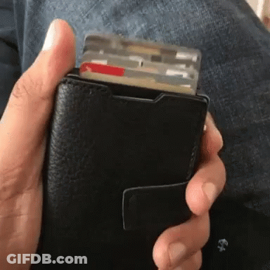 Person Holding Black Wallet With Credit Cards GIF