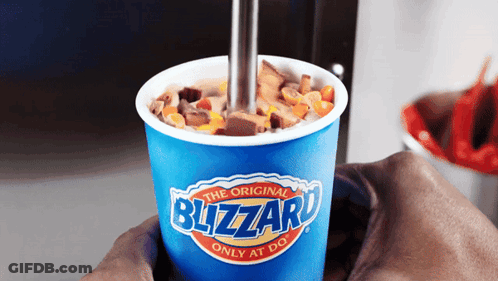 Person Holding Blizzard Cup GIF