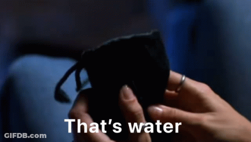 Person Holding Blue Bottle Saying That's Water GIF