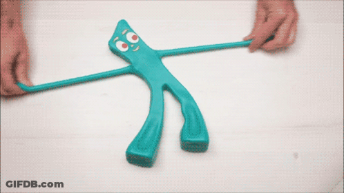 Person Holding Blue Googly-Eyed Object GIF