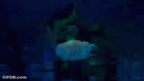 Person Holding Blue Umbrella In Rain GIF