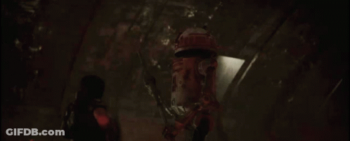 Person Holding Bomb In Dark Room GIF