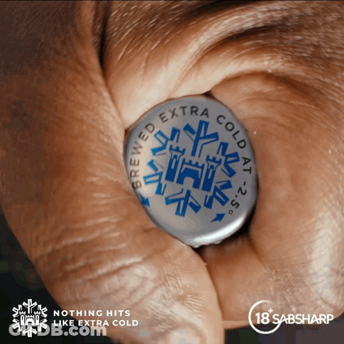 Person Holding Bottle Cap Brewed Extra Cold At 25 Degrees GIF