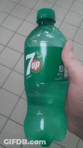 Person Holding Bottle Of 7Up GIF