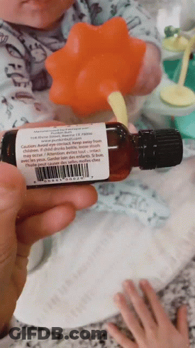 Person Holding Bottle Saying Caution GIF