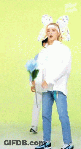Person Holding Bouquet Of Blue Flowers GIF