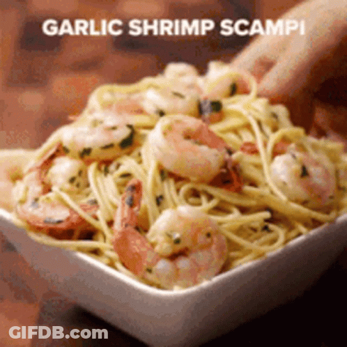 Person Holding Bowl Of Garlic Shrimp Scampi Noodles GIF