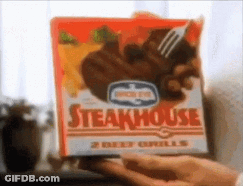 Person Holding Box Of Steakhouse Beef Grills With Fork GIF